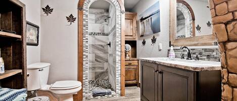 Bathtub, hair dryer, towels, soap