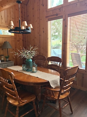 Dining room attached to living room and kitchen. Table has extra leaf if needed