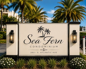 A sign for Sea Fern Condominium at 380 S. Atlantic Ave. - Beautiful 1500SF, Heated Pool w/Direct Beach Access No Drive Beach, Pets OK! (Daytona Beach Shores)
