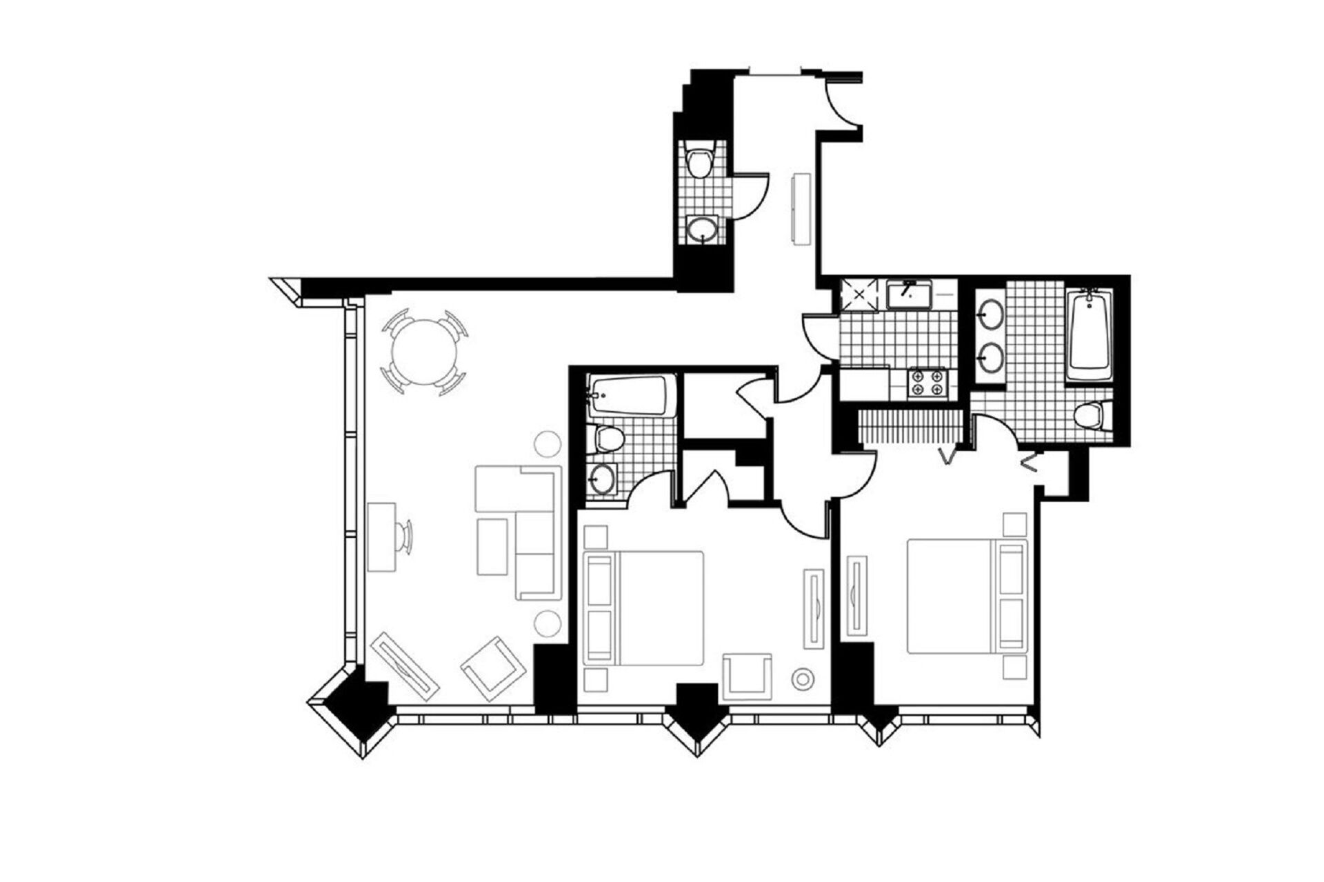 A floor plan of a hotel room with a bathroom, a kitchenette, a dining area, and a living room.