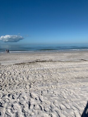 On the beach, sun loungers, beach towels