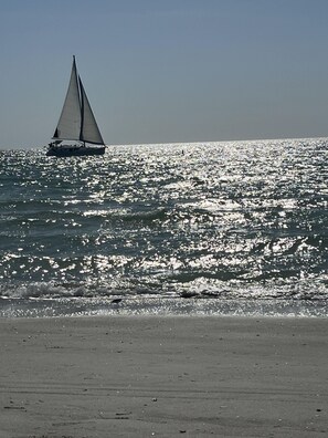 On the beach, sun-loungers, beach towels