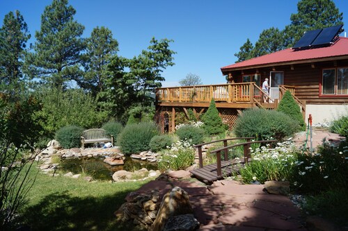 Log Cabin with a Mountain View. Secluded property with easy access to amenities