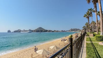 On the beach, sun loungers, beach towels