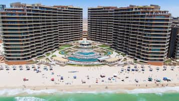 On the beach, sun-loungers, beach towels