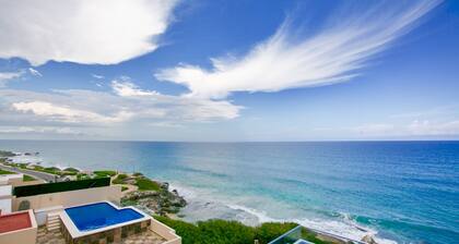 Luxury condo rooftop pool with 360° ocean views