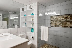 Shower, hair dryer, towels, toilet paper