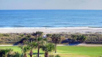 On the beach, sun loungers, beach towels