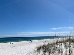 On the beach, sun loungers, beach towels