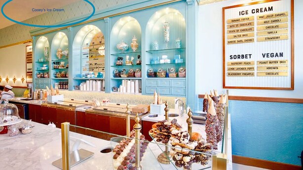 An ice cream parlor with a variety of ice cream flavors and sorbets displayed on shelves and a menu board. - Charming Studio in Heart of City Park--Minutes to downtown!! MANY AMENITIES!! (Denver)