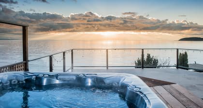 Lovely Waterfront Beach Haven with Hot Tub & SUP