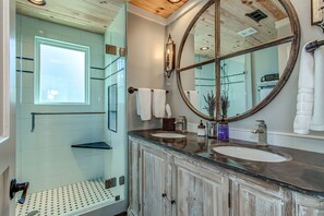 Shower, hair dryer, towels, toilet paper