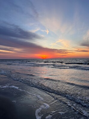 On the beach, sun loungers