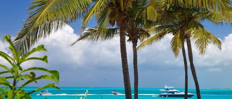 On the beach, sun-loungers, beach towels
