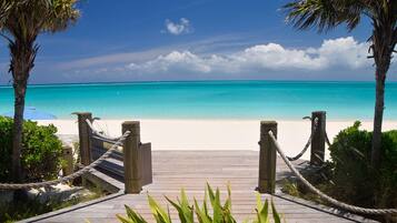 On the beach, sun loungers, beach towels