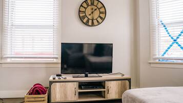 1 bedroom, desk, iron/ironing board, travel crib