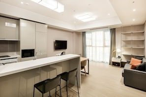 Suite Familiale, 2 chambres, chambres communicantes (Residence Studio) | Salle de séjour