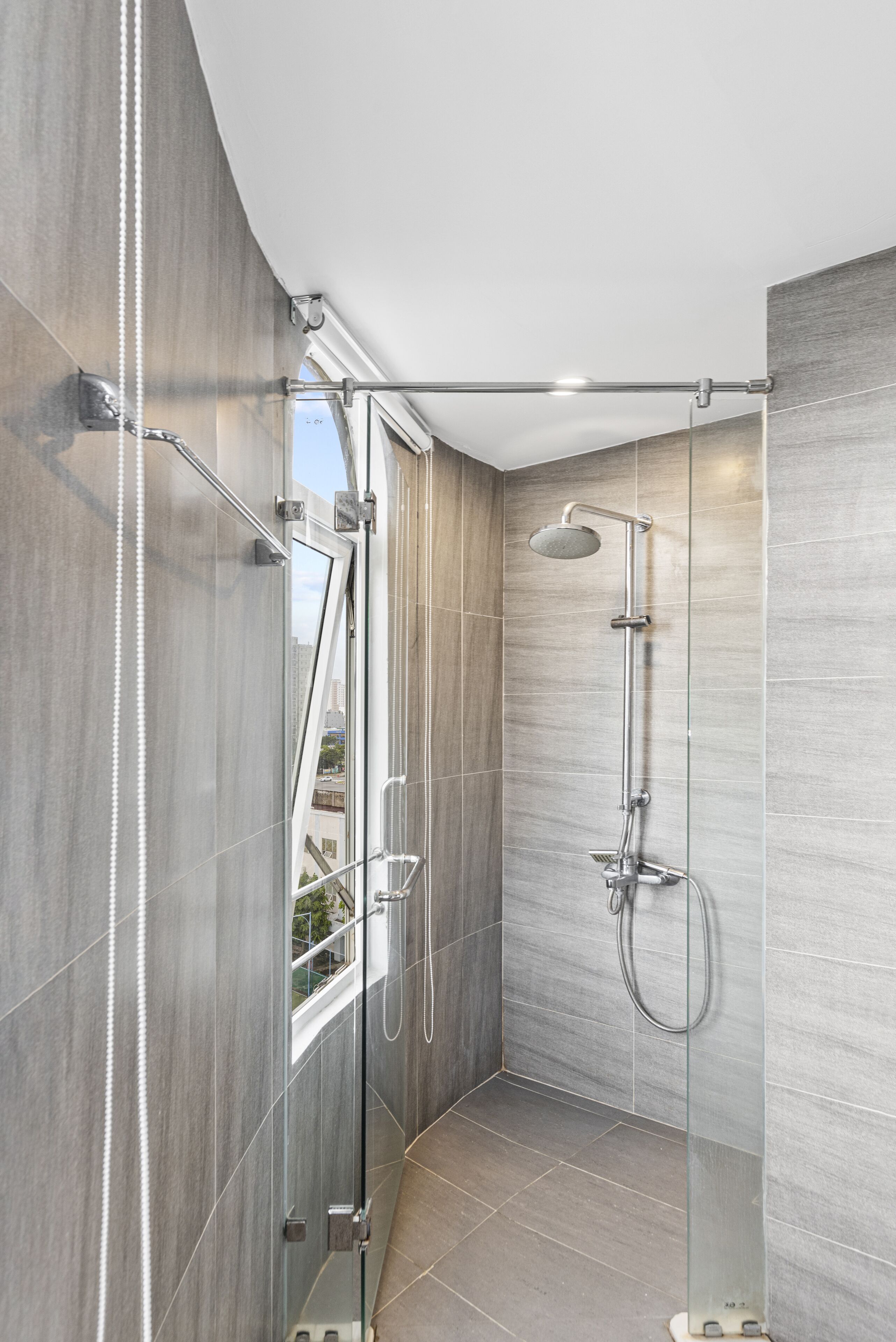 Family Room, 2 Double Beds, City View | Bathroom | Shower, hydromassage showerhead, free toiletries, hair dryer