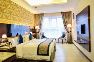 Deluxe Room | Premium bedding, minibar, in-room safe, desk