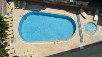 Outdoor pool, open 9:00 AM to 7:30 PM, pool umbrellas, sun loungers