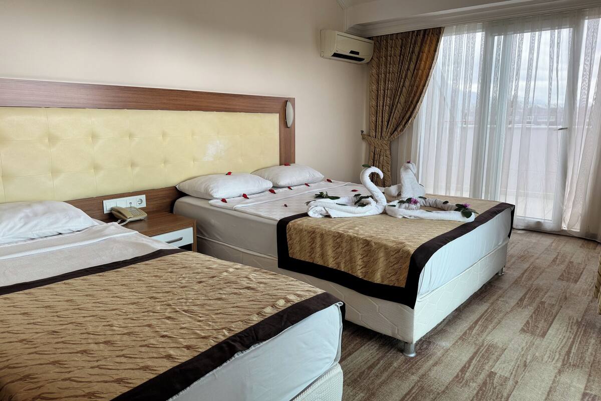 Minibar, iron/ironing board (on request), bed sheets