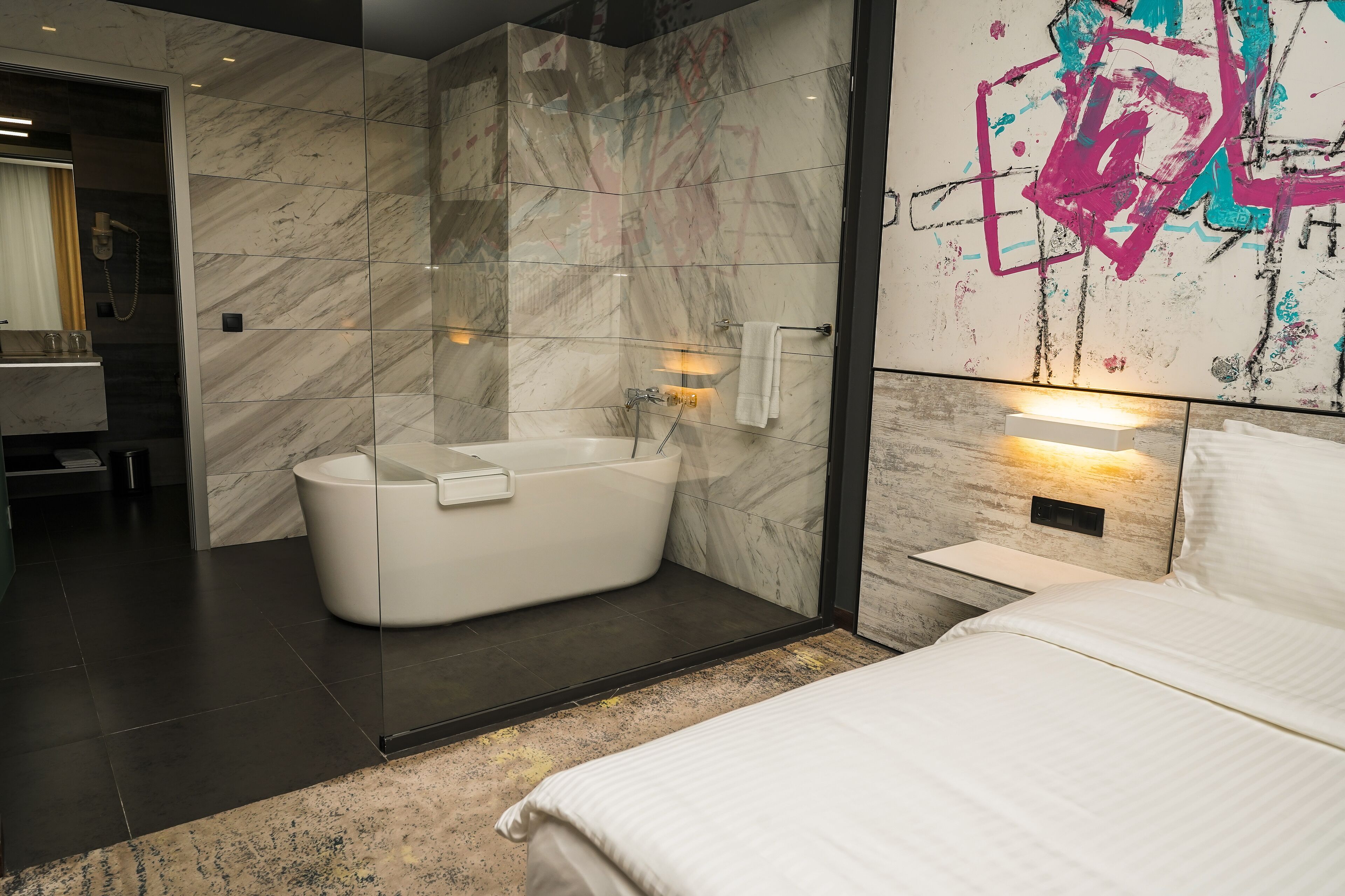 art deluxe | bathroom | separate bathtub and shower, free toiletries, hair dryer, bathrobes