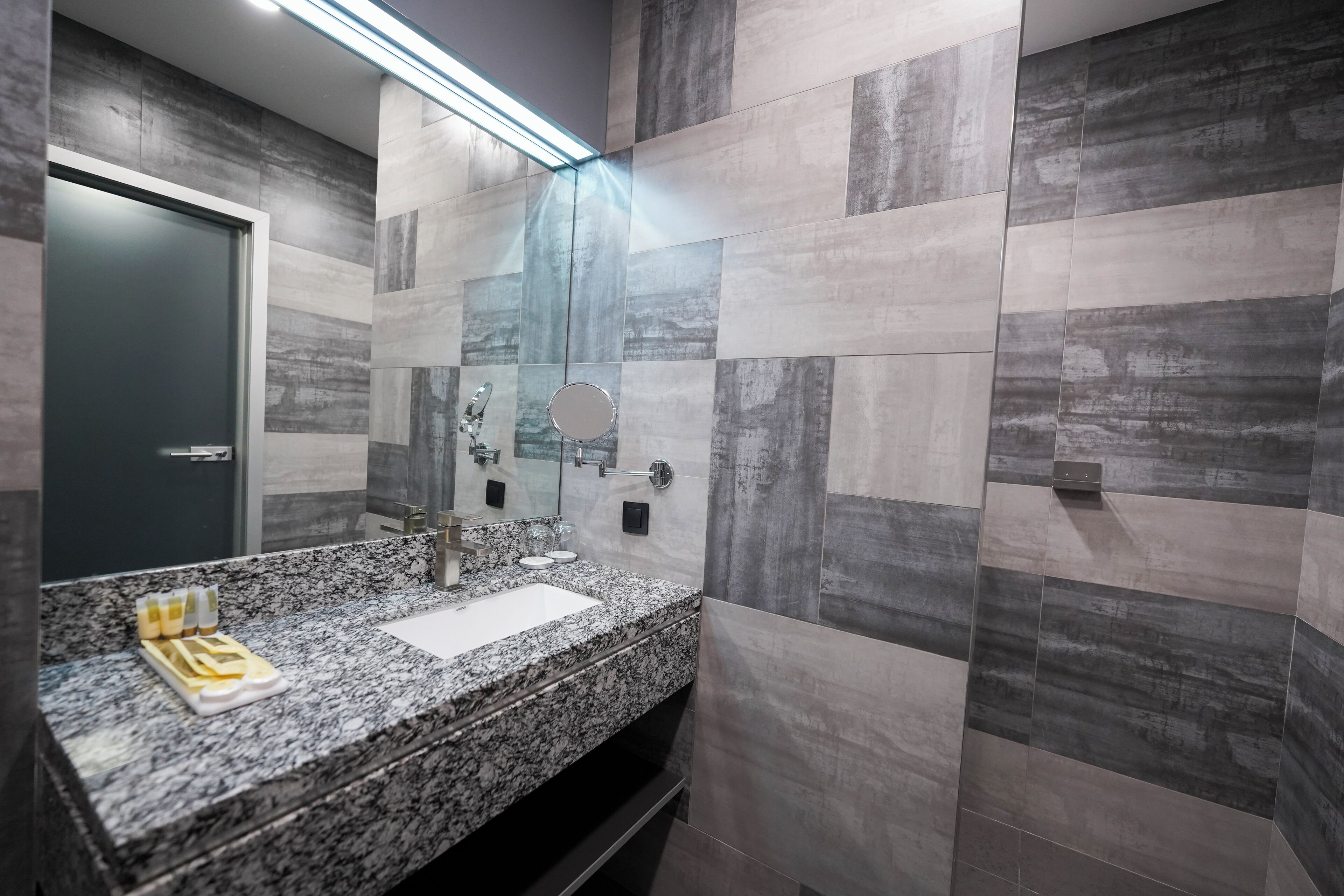 superior king room | bathroom | separate bathtub and shower, free toiletries, hair dryer, bathrobes