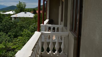 Suite, 1 cama doble | Balcón