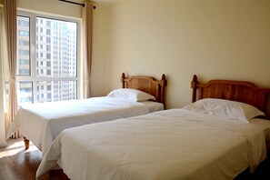 Chambre avec lits jumeaux, vue mer