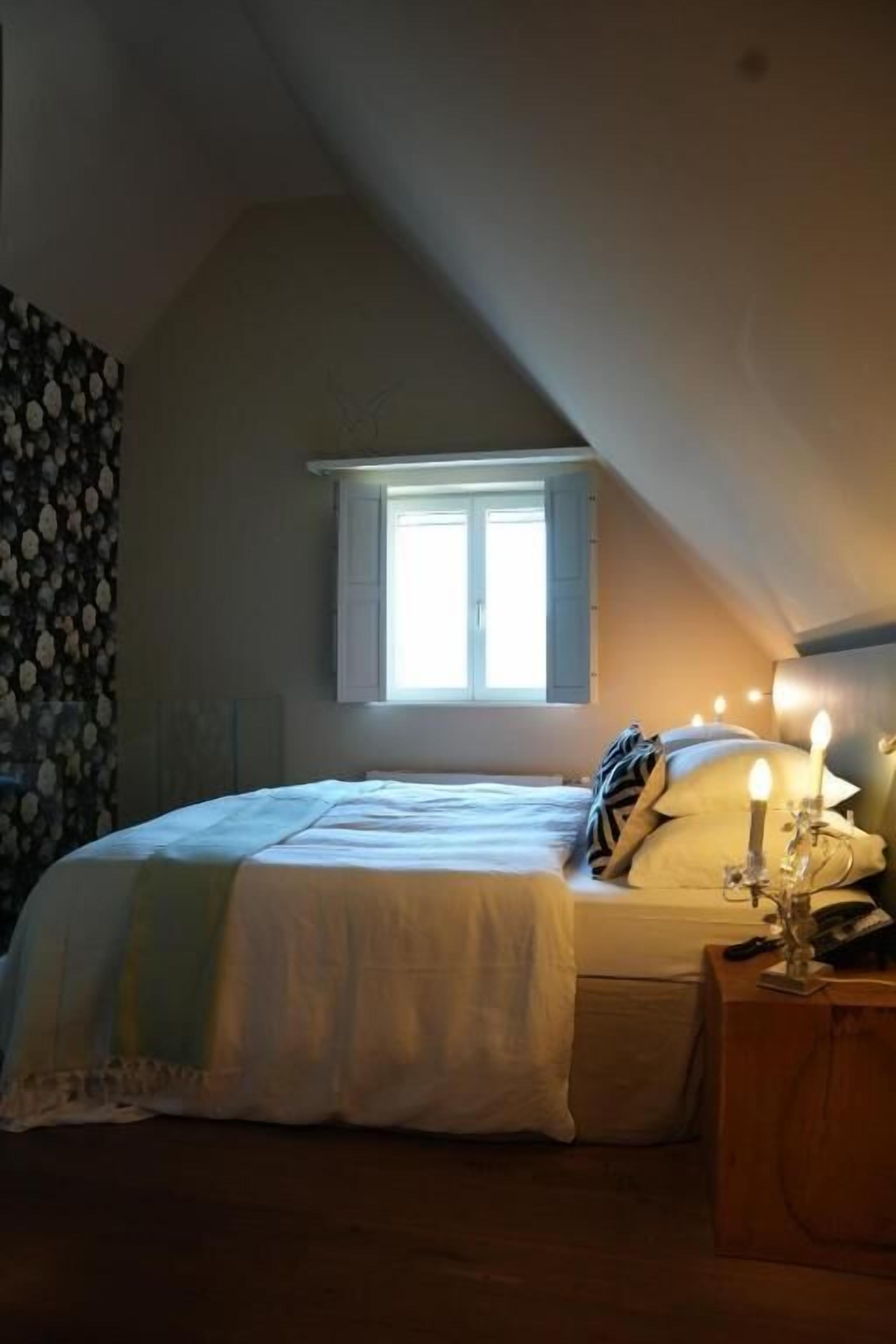 Deluxe Suite, Lake View | Premium bedding, in-room safe, iron/ironing board
