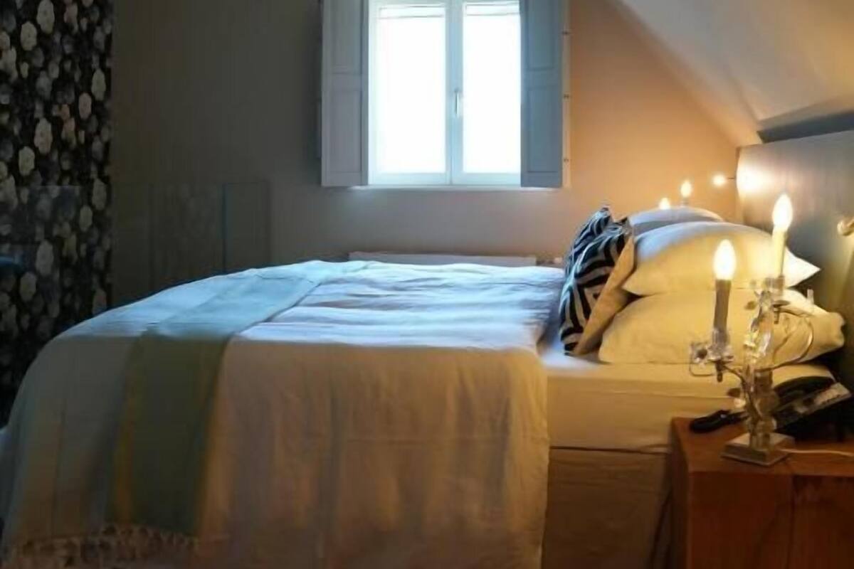 Deluxe Suite, Lake View | Premium bedding, in-room safe, iron/ironing board