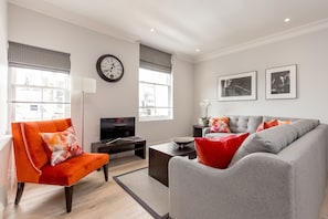 Apartment, 1 Bedroom | Living area | Flat-screen TV