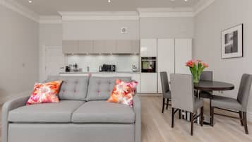 Superior Apartment, Castle View | Living area | Flat-screen TV