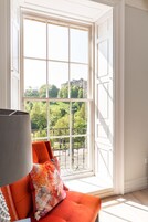 Desk, iron/ironing board, travel cot, rollaway beds