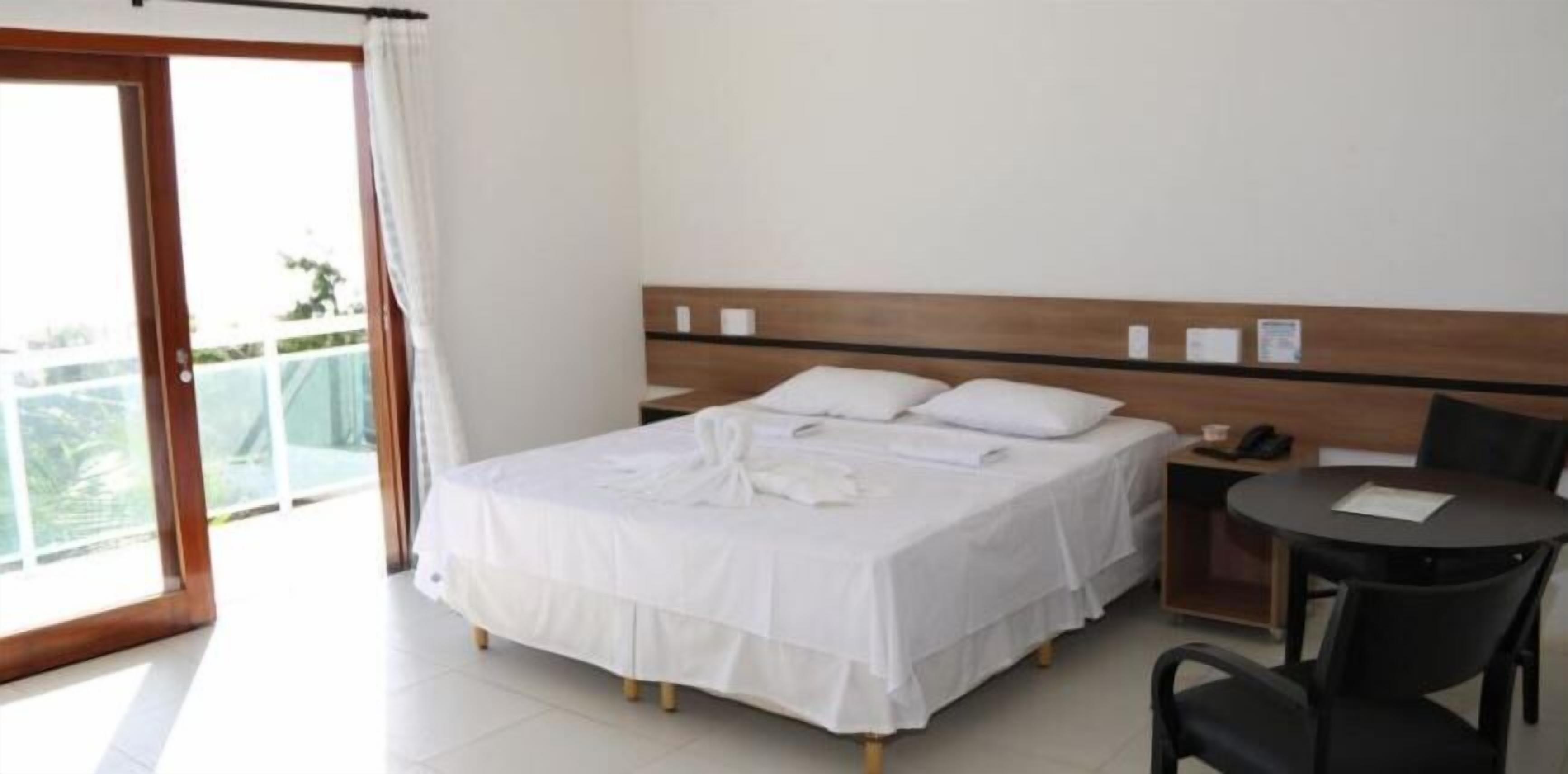 Luxury Twin Room, 1 King Bed, Beachfront | Minibar, blackout drapes, free WiFi
