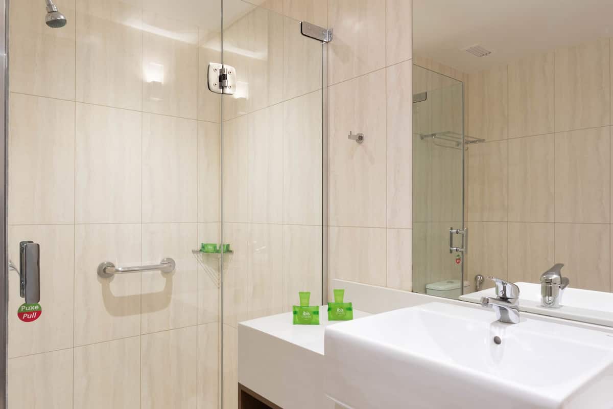 shower, eco-friendly toiletries, hair dryer, towels