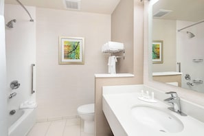 A modern bathroom with a bathtub, toilet, and sink. - Fairfield Inn & Suites by Marriott North Bergen (North Bergen)