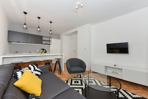 One Bedroom Apartment, Balcony, Garden view (A6) | Living area | Flat-screen TV - Mediterraneo Garden Apartments (Zadar)