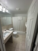 Standard Room, 2 Double Beds | Bathroom | Combined shower/tub, towels