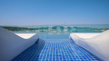 Outdoor pool, sun loungers