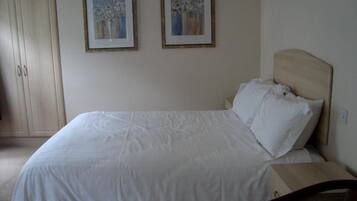 Desk, blackout curtains, free WiFi, bed sheets