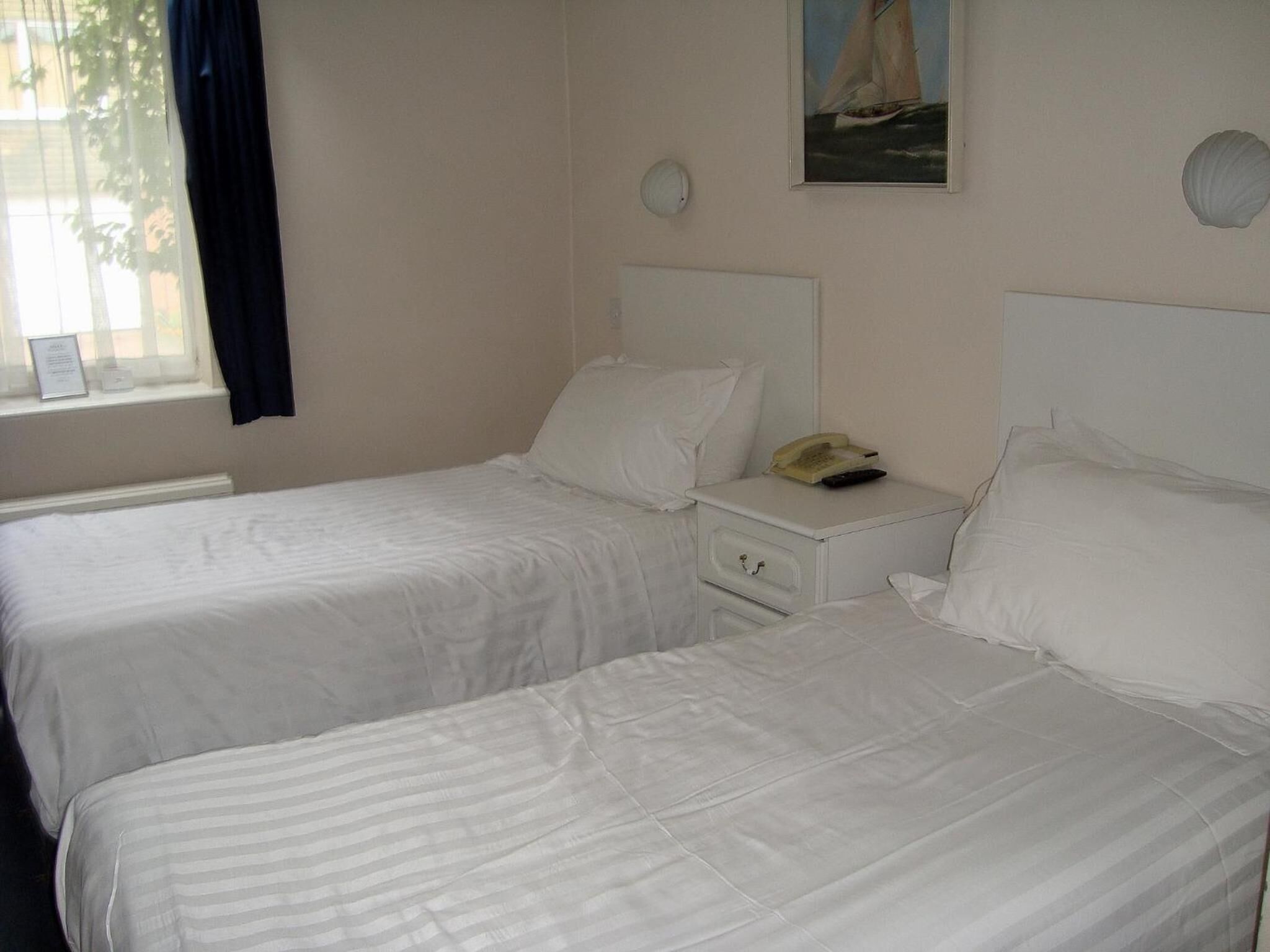 desk, blackout curtains, free wifi, bed sheets