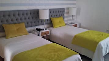 Desk, blackout drapes, soundproofing, rollaway beds