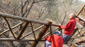 A wooden structure with a person standing on it.