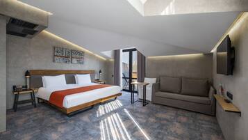 Suíte, terraço | 1 quarto, cofres nos quartos, escrivaninha, Wi-Fi de cortesia