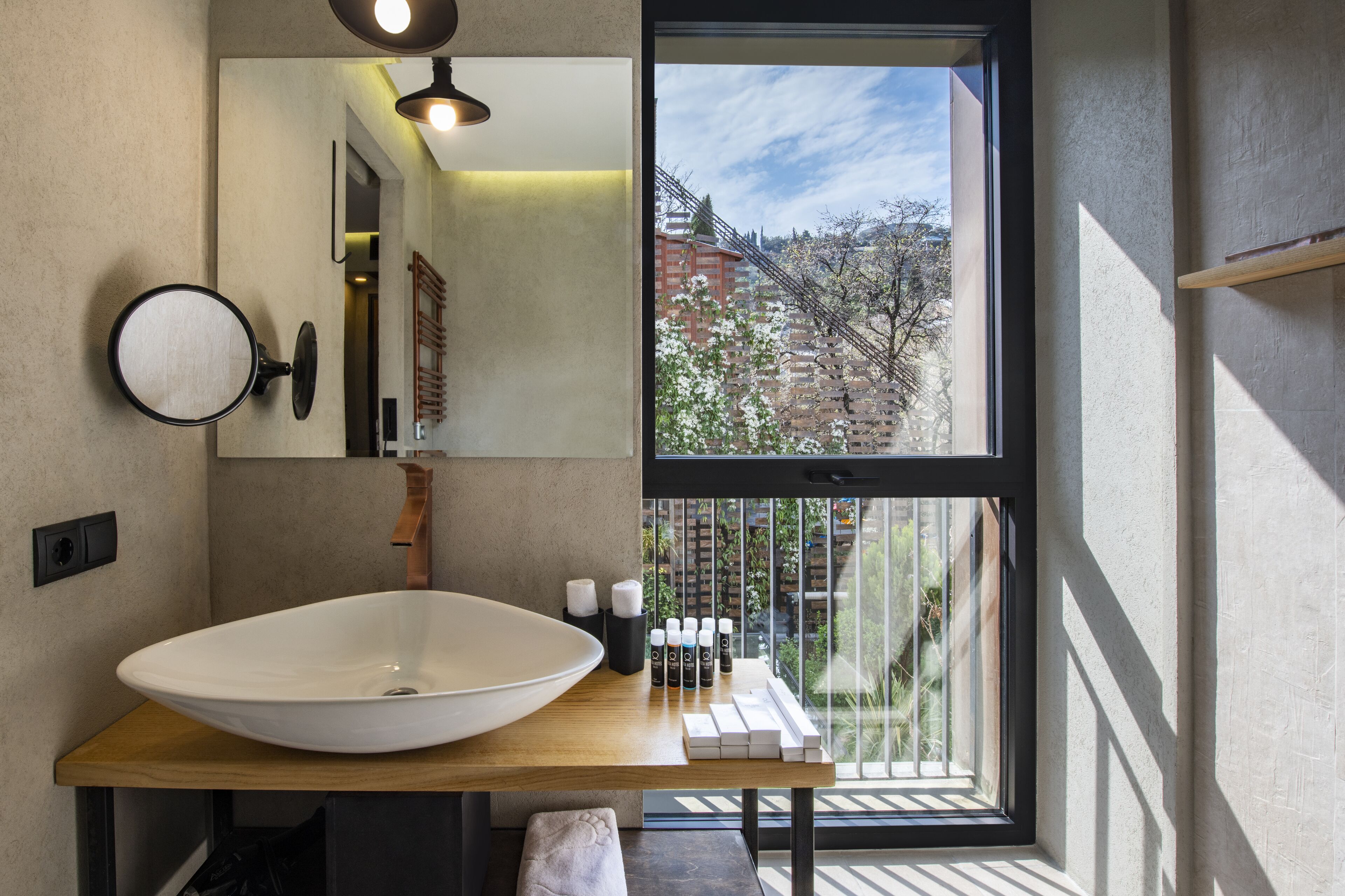 twin room (iota twin) | bathroom | shower, free toiletries, hair dryer, dressing gowns