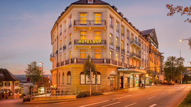 A multi-story hotel with a classic European architectural style, featuring balconies and large windows. - Hotel Ruf (Pforzheim)