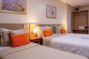 Family Apartment, Ensuite (Suite Exterior 03) | Premium bedding, desk, blackout drapes, rollaway beds - Pousada Nanai (Foz do Iguaçu)