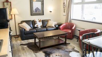 Premium Suite, 2 Bedrooms, Mountain View | Living room | 32-inch LCD TV with cable channels, TV