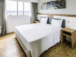 Departamento estándar, 1 cama matrimonial | Minibar, caja de seguridad en la habitación y escritorio